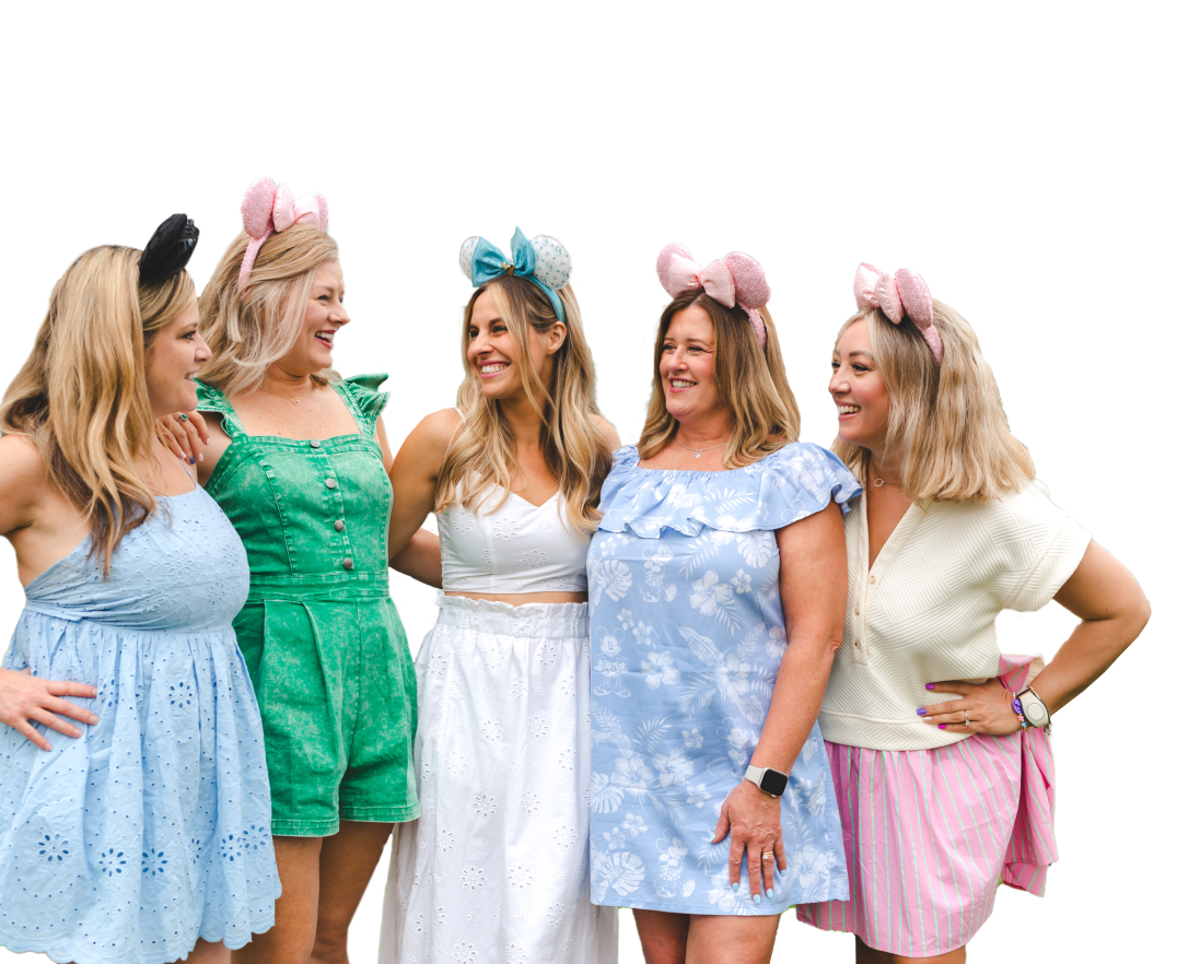 Smiling women with mickey mouse ears